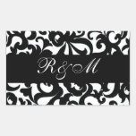 Autocollant blanc noir décoré d'un monogramme
