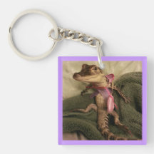 baby alligator carrying a purse keychain