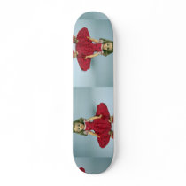 Baby girl doll dressed in red skate decks