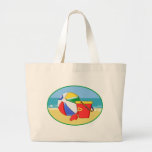 Ballon de plage, seau et pelle au rivage sacs de toile