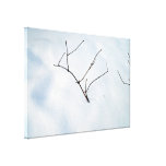 Bare branches sticking out of the snow stretched canvas prints