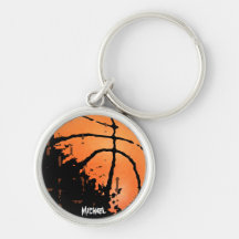Basket-ball affligé avec le nom porte-clés