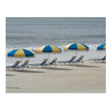 beach chairs and umbrellas post card