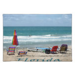 beach chairs surfboards umbrellas sand ocean place mats