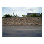 Beautiful Shot of Stone Wall and Plants Against Bl Post Cards