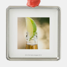 Beer bottle with lime wedge ornaments