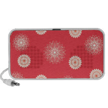 Beige flowers on dark orange PC speakers