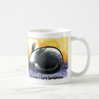 Belly up Tuxedo cat with a headache Mugs