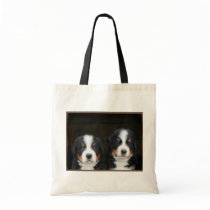 Bernese mountain dog puppies tote bag