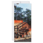 Bicycle by Train Station Full Color Rack Card