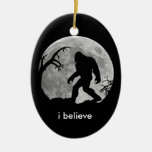 Bigfoot - I believe with moon and tree silhouette Christmas Ornaments