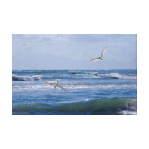 Birds diving into the ocean canvas print