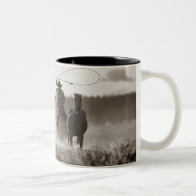Black and White photo of a Cowboy Lassoing Horses Coffee Mugs