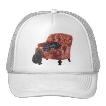 Black Cat and Scottish Terrier in a Red Chair Trucker Hats