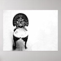 black chair in snow poster