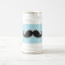 Black handlebar moustache on blue polka dot patter coffee mug