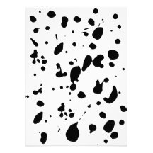 Black paint splats on white photographic print