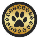 BLACK PAW PRINTS ON GOLD ROUND STICKER