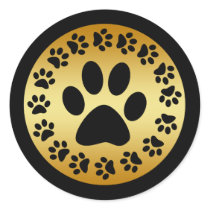 BLACK PAW PRINTS ON GOLD ROUND STICKER