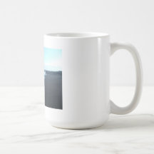 black sand beach coffee mug