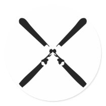 black skier crossed round sticker