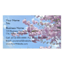 Blossoming pink flowers against blue sky business card template