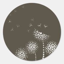 blowing flowers round sticker