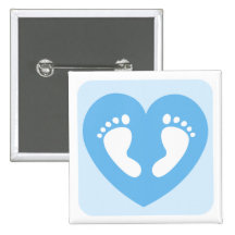 Blue baby boy feet or footprints in heart button