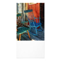 Blue Chair Against Red Door