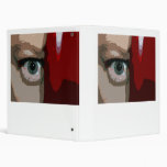 Blue eye from behind red bass close up vinyl binders