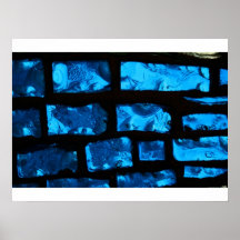 Blue glass chunks with black grout between them poster