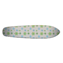 Blue green snowflakes on silver skateboards