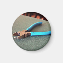 Blue side cutter on table fridge magnet