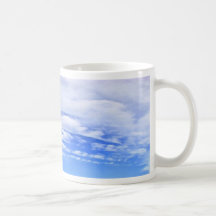 Blue sky with beautiful white clouds coffee mug