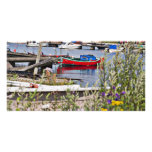 Boats docked in small harbour