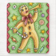 Bonhomme en pain d'épice soufflant son klaxon, suc tapis de souris