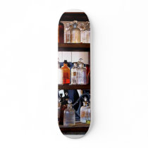 Bottles of Chemicals on Shelves Skate Board