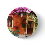 Bougainvillea growing outside a house, Mykonos, Gr Button