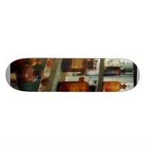Bouteilles de produits chimiques grands et courts plateaux de skateboards
