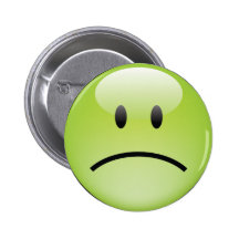 Bouton malheureux de visage badge avec épingle