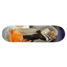 Bride and groom wedding cake topper skate boards