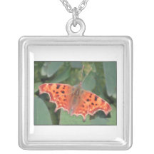Bright orange butterfly. Comma. Pendant