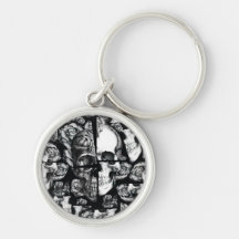 Broken up, fractured images of rose skull in black keychains
