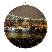 Brooklyn bridge at night dartboard with darts