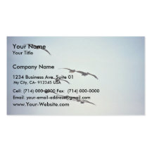 Brown pelicans in flight business card templates