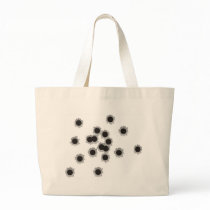 Bullet holes from a rifle or gun, possibly shotgun bags