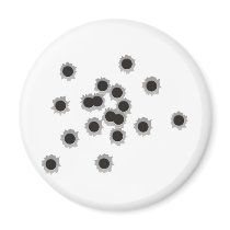 Bullet holes from a rifle or gun, possibly shotgun fridge magnets