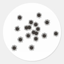 Bullet holes from a rifle or gun, possibly shotgun round sticker