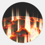 burning planet round sticker
