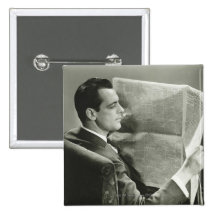 Businessman Reading the Newspaper Pinback Button